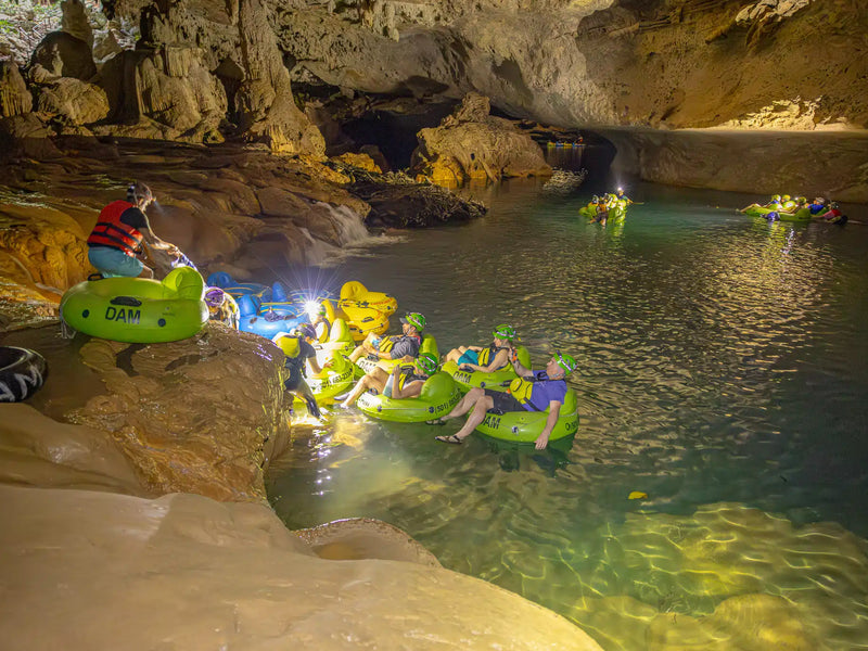 Belize cave tubing dark