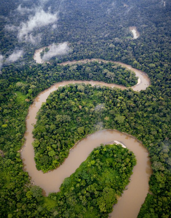 Aerial winding S bend river in Amazon rainforest aerial