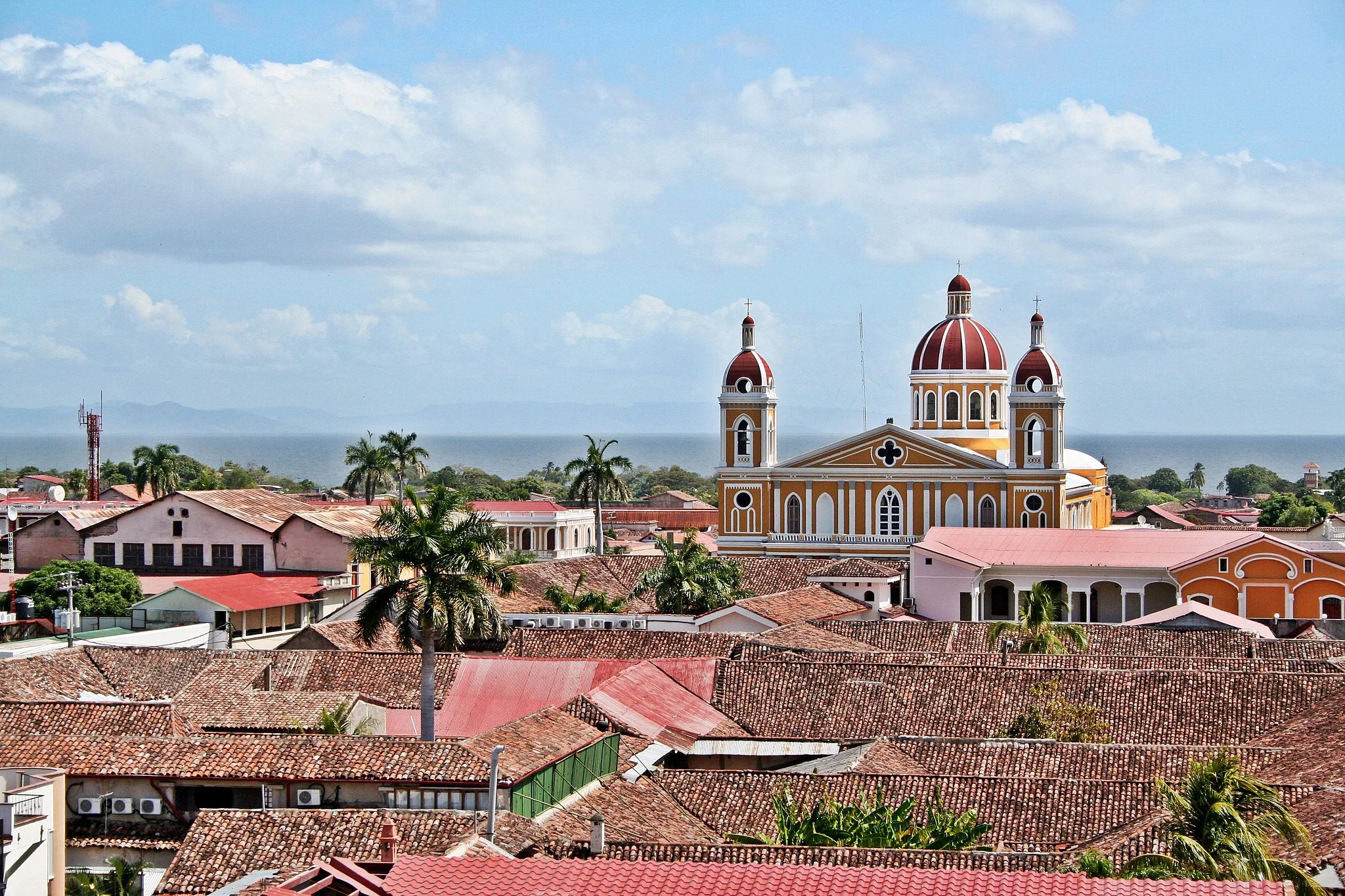 Nicaragua Granada city view, cathedral over clay rooftops traditional colonial architecture