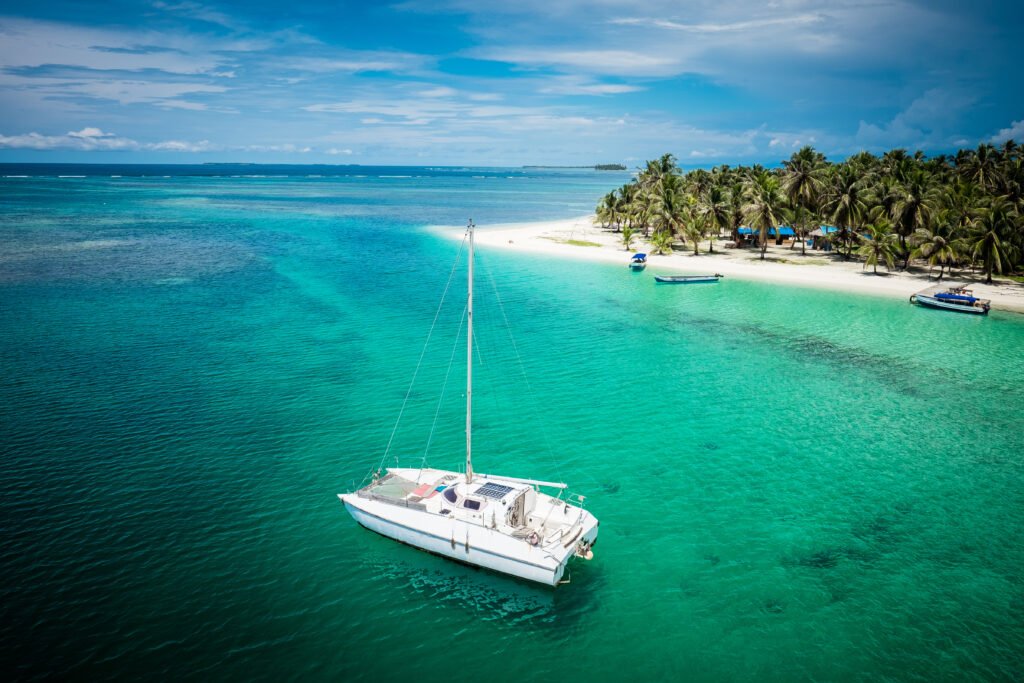 Sail boats docked by beautiful islands San Blas Panama