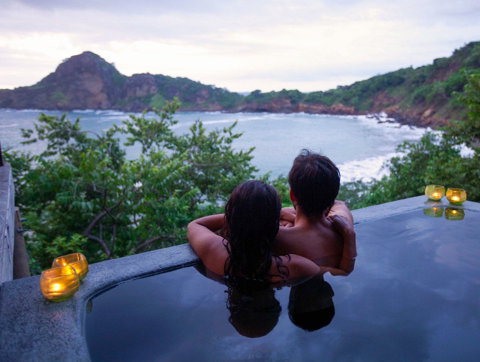Nicaragua Aqua honeymoon couple in plunge pool overlooking the bay